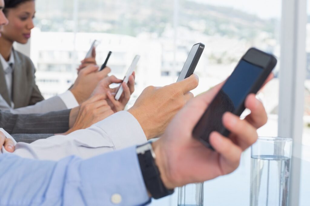 business team using their mobile phone 13339 133912