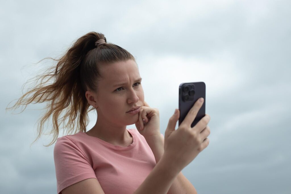 happy young girl uses her phone roof house balcony city background woman taking selfie 157823 3898